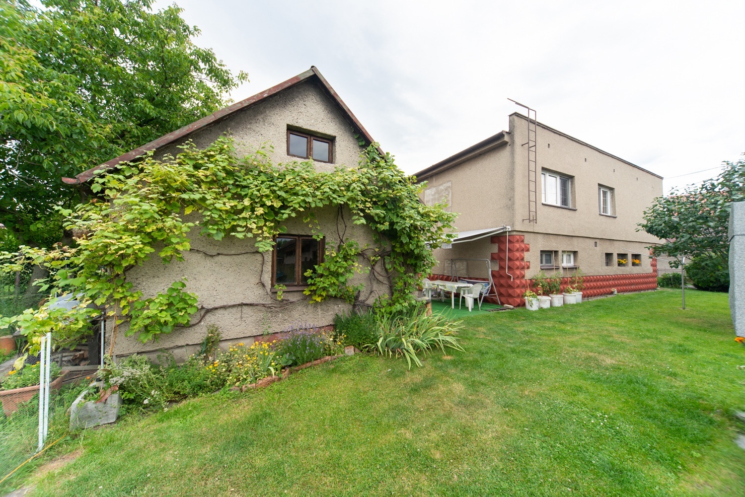 Prodej rodinného domu s udržovanou zahradou, garáží, balkonem, v obci Dolní Lutyně - Věřňovicích