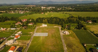 Stavební pozemek,  napojený na inženýrské sítě a s vyřízeným stavebním povolením na rodinný dům, 1007 m2,  Horní Tošanovice