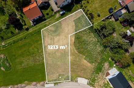 Prodej stavebního pozemku 1 213 m², Dubany