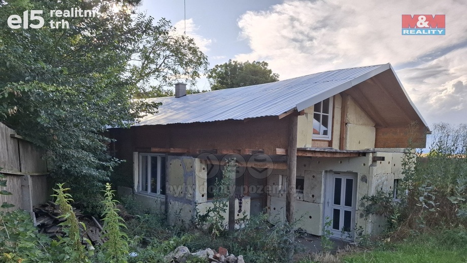 Prodej stavebního pozemku 413 m², Měcholupy