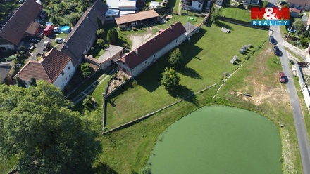 Prodej stavebního pozemku 889 m², Býkev