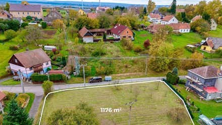 Prodej stavebního pozemku 1 176 m², Janov