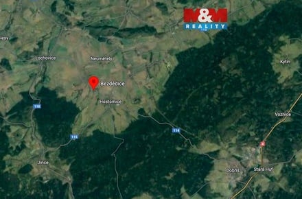 Prodej stavebního pozemku 1 582 m², Hostomice