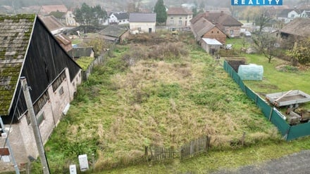 Prodej stavebního pozemku 911 m², Cholenice