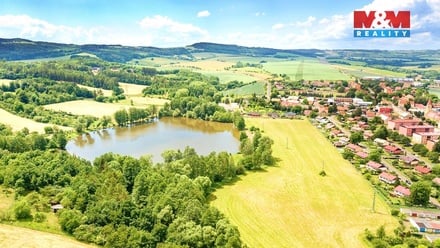 Prodej stavebního pozemku 730 m², Lubenec