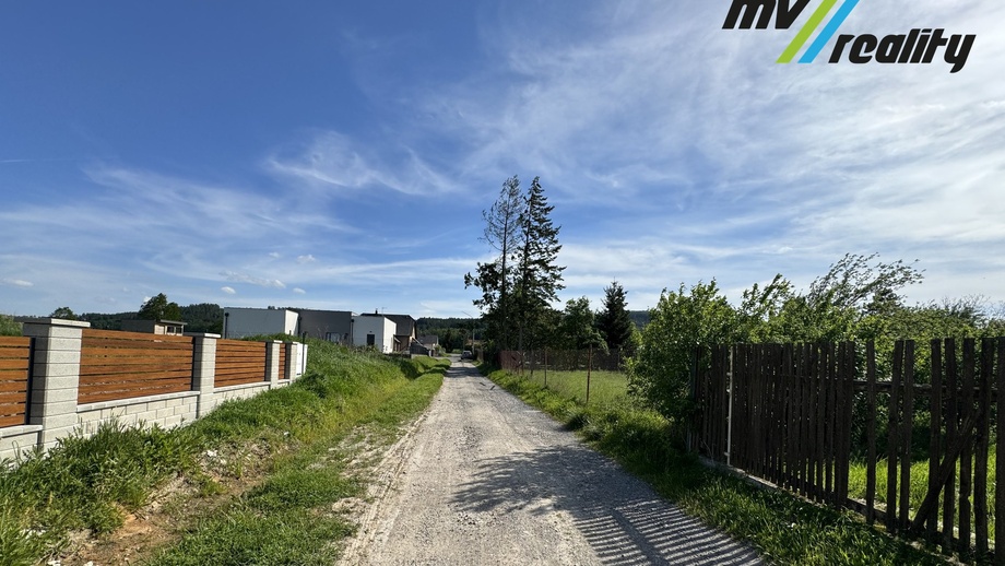 Prodej stavebního pozemku 1 210 m², Kamenný Újezd
