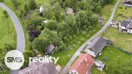 Prodej stavebního pozemku 1 316 m², Holčovice - Spálené