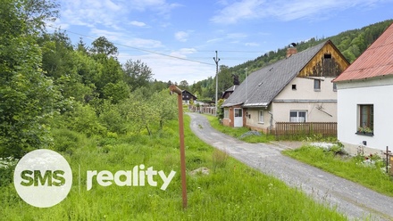 Prodej stavebního pozemku 1 316 m², Holčovice - Spálené