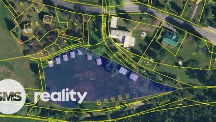 Prodej komerčního pozemku 6 661 m², Holčovice - Komora