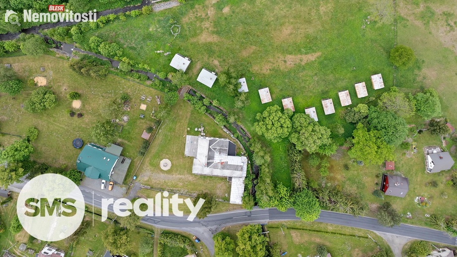 Prodej komerčního pozemku 6 661 m², Holčovice - Komora