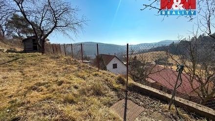 Prodej stavebního pozemku 1 061 m², Dolní Hbity
