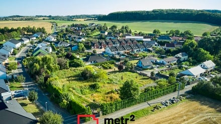 Prodej stavebního pozemku 1 377 m², Tršice - Hostkovice