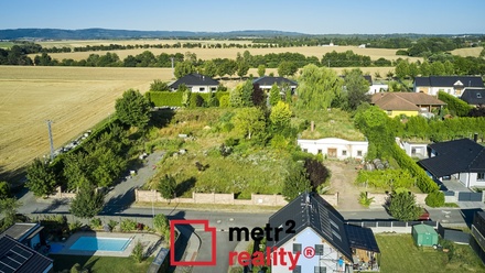 Prodej stavebního pozemku 1 529 m², Tršice - Hostkovice