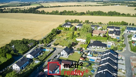 Prodej stavebního pozemku 1 529 m², Tršice - Hostkovice