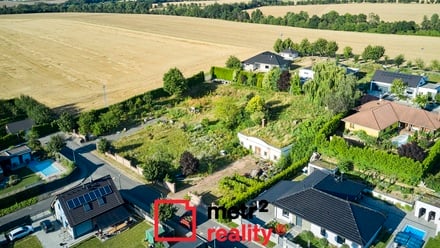 Prodej stavebního pozemku 1 529 m², Tršice - Hostkovice