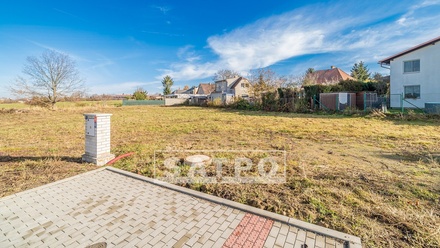 Prodej stavebního pozemku 1 075 m², Praha-Šeberov